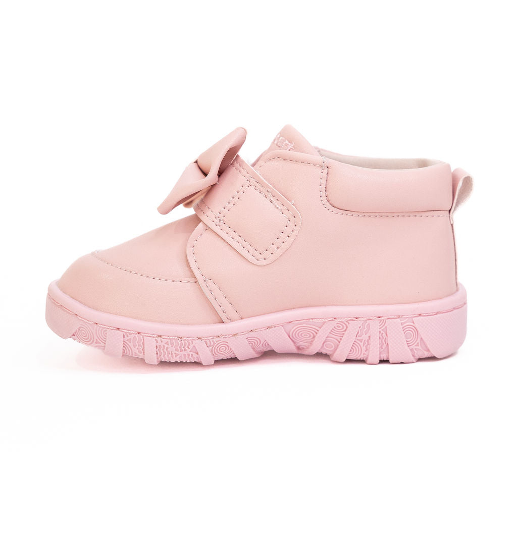 Pink children's shoe with a bow on a white background | Lexi Pink prewalker boots by Billycart Kids Australia | Podiatrists recommended first walker boots for toddler girls